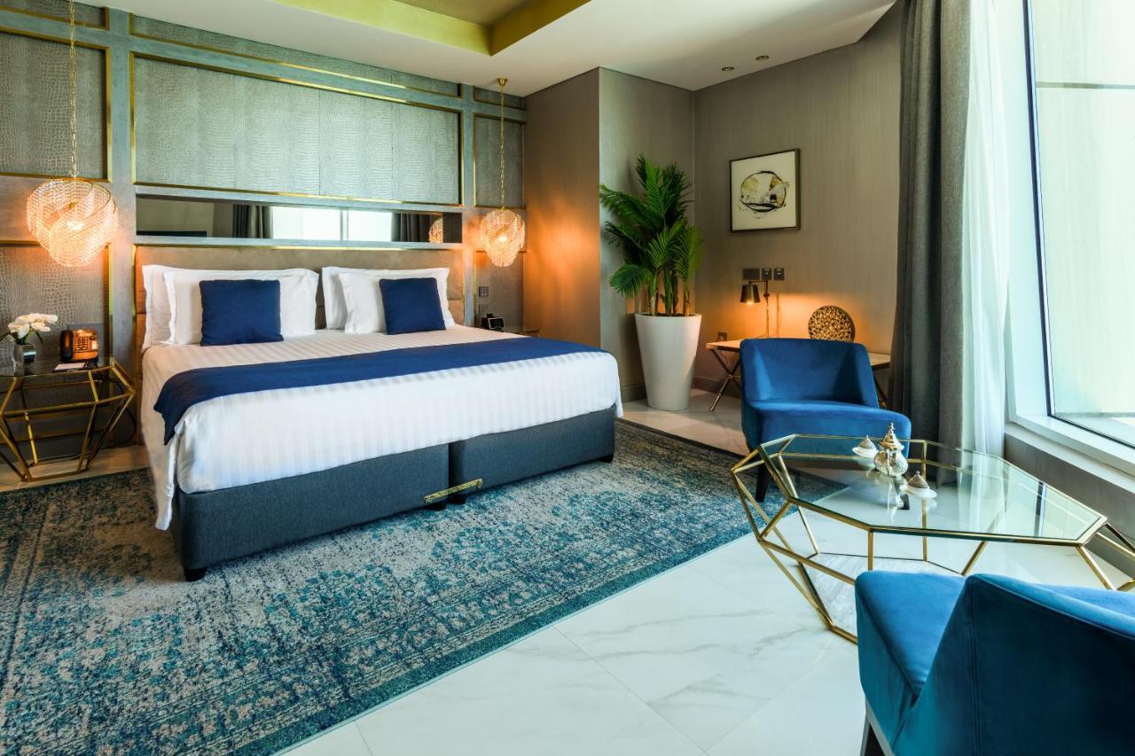 Centara West Bay Hotel & Residences Доха Екстериор снимка Deluxe Room