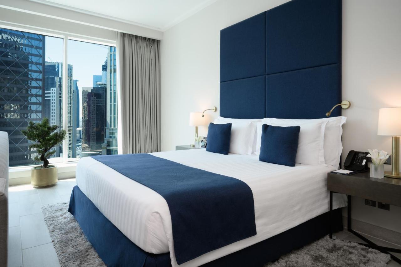 Centara West Bay Hotel & Residences Доха Екстериор снимка A bedroom at the hotel