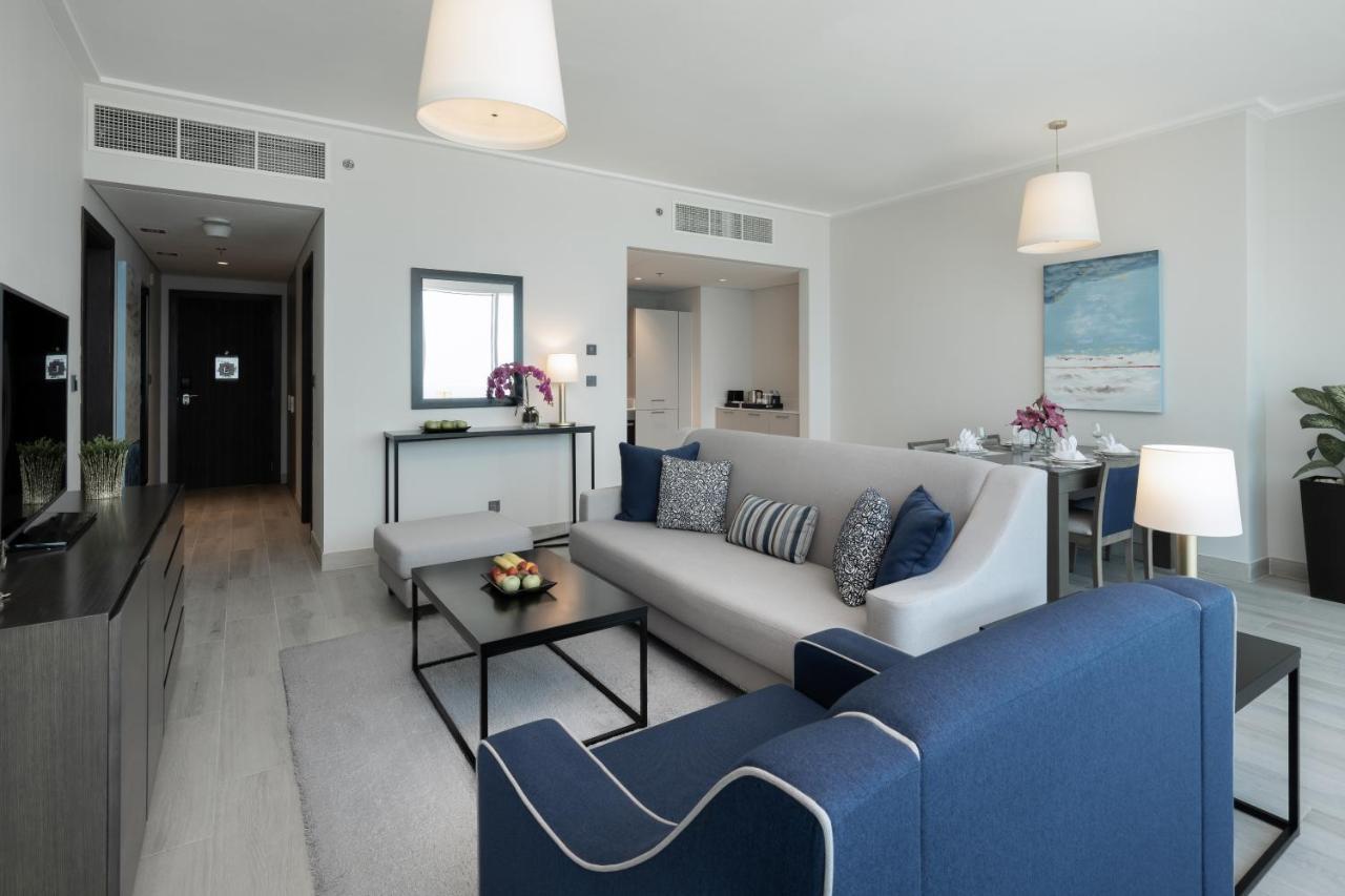 Centara West Bay Hotel & Residences Доха Екстериор снимка A living room at the Address Downtown Hotel