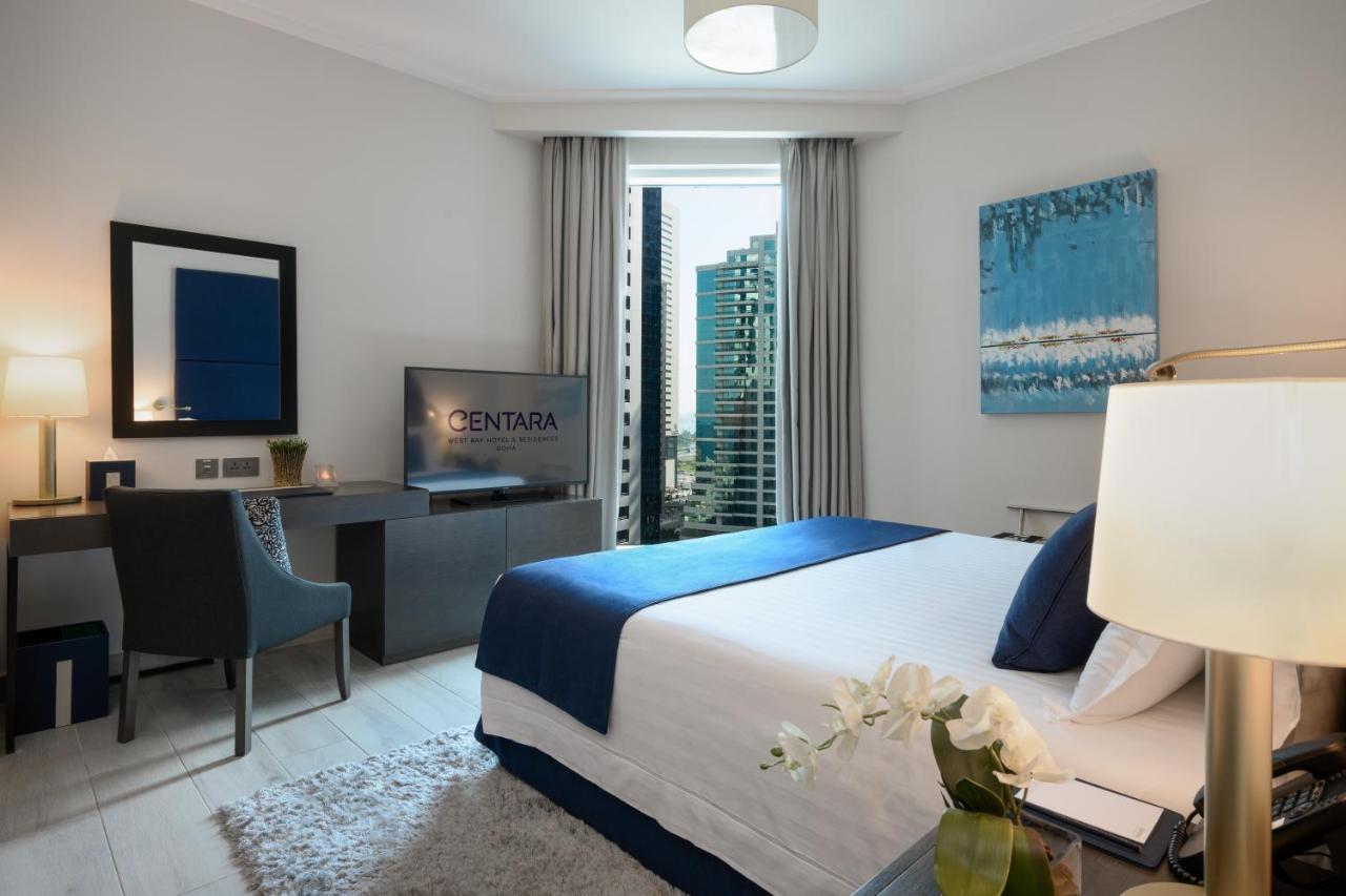 Centara West Bay Hotel & Residences Доха Екстериор снимка A bedroom at the hotel
