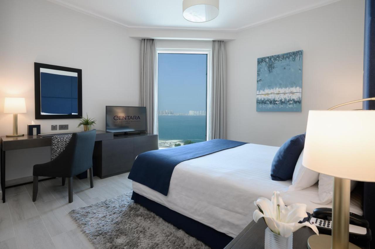 Centara West Bay Hotel & Residences Доха Екстериор снимка A bedroom at the Ritz-Carlton, Bahrain