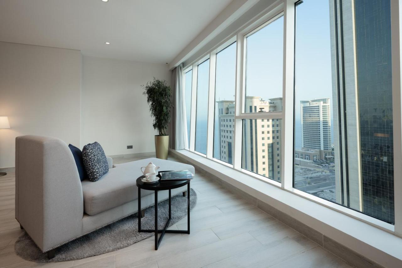 Centara West Bay Hotel & Residences Доха Екстериор снимка A view from a residential apartment