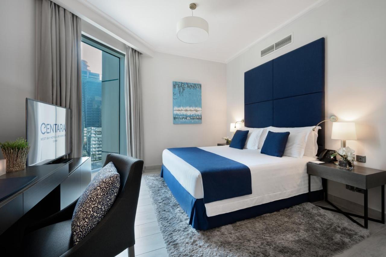 Centara West Bay Hotel & Residences Доха Екстериор снимка A bedroom at the Address Downtown Hotel